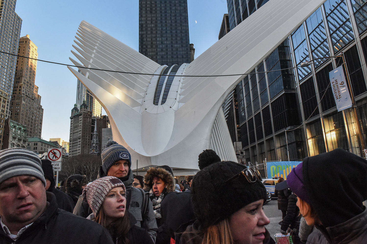 People bundle up against the cold temperature outside of the Oculus building in New York City, U.S. December 23, 2017. REUTERS/Stephanie Keith